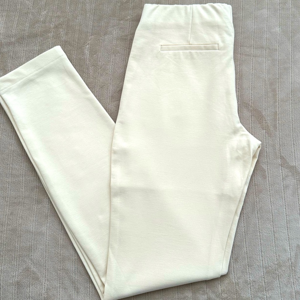Ivory leggings/pants, never used, no tag. Size S/M